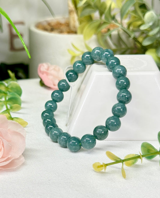 Blue water jade bracelet. 8.8mm beads and fits wrist size 7”