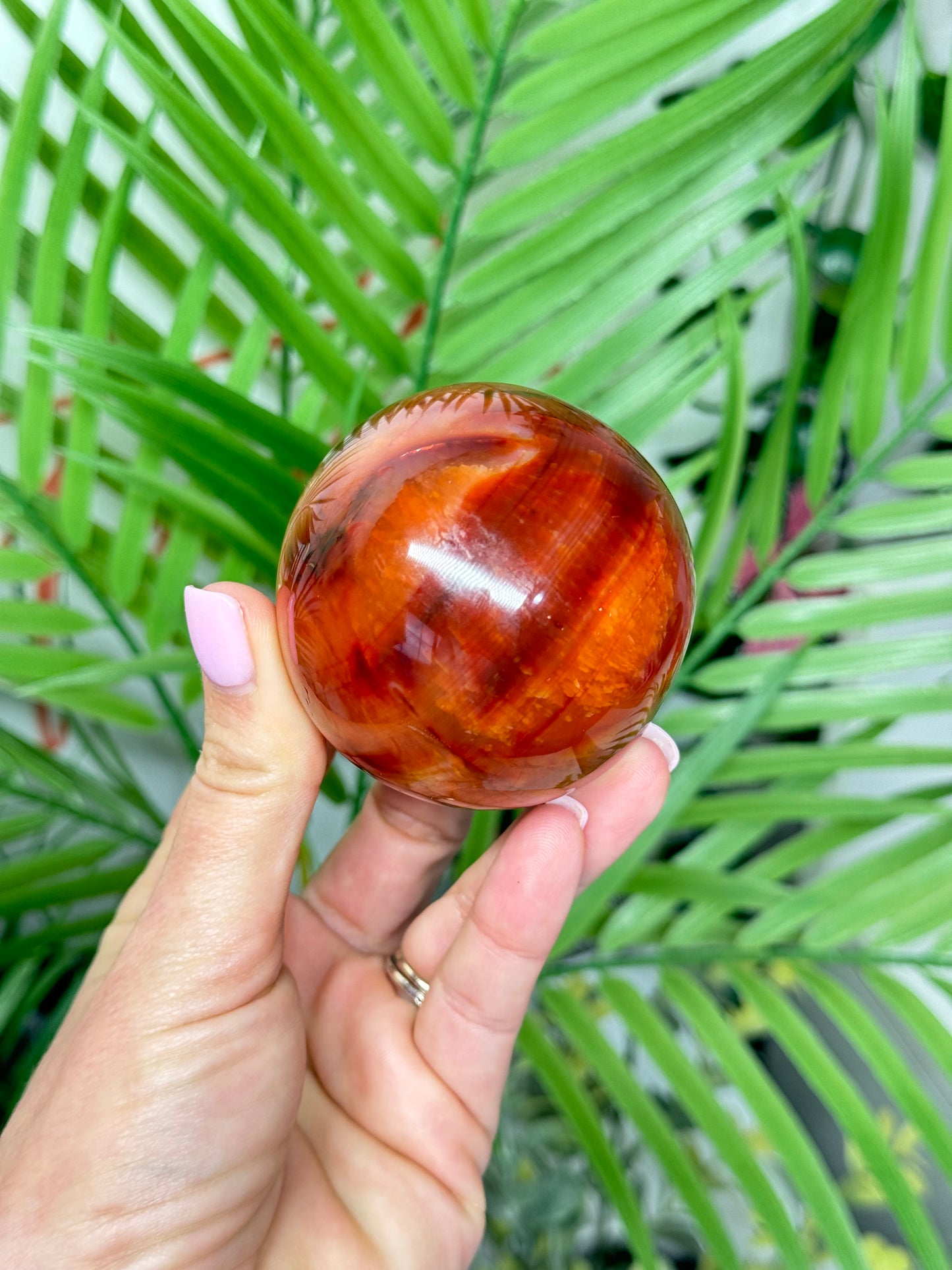 Carnelian sphere 59mm. Includes free sphere stand.