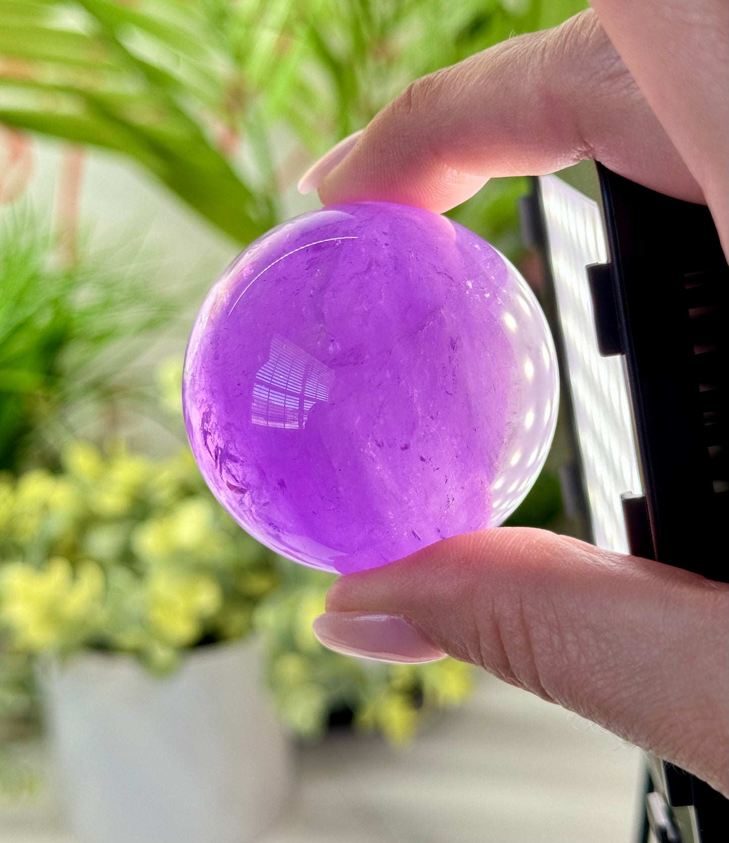 Beautiful amethyst sphere. 46.5mm and will include a sphere stand. *see attached photos for back lighting