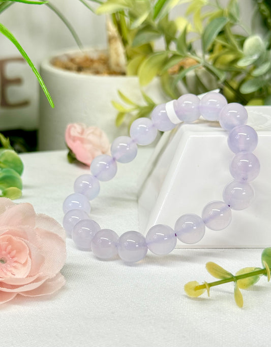 Lavender chalcedony bracelet. 10.3mm beads and fits wrist size 7”