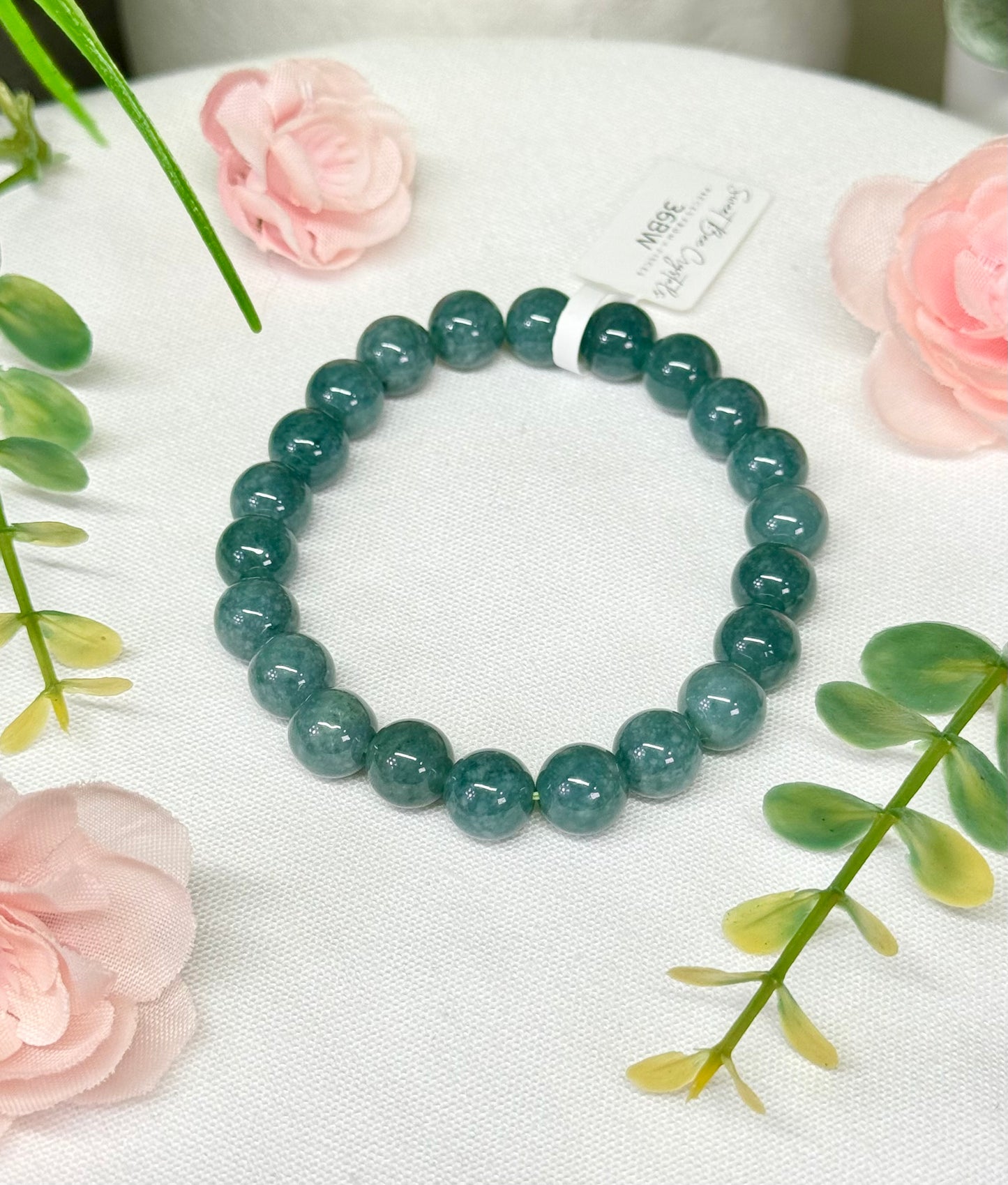 Blue water jade bracelet. 8.8mm beads and fits wrist size 7”