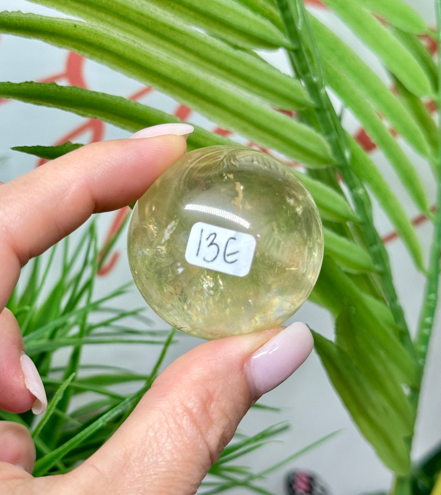 Honey calcite sphere. 40mm includes a sphere stand