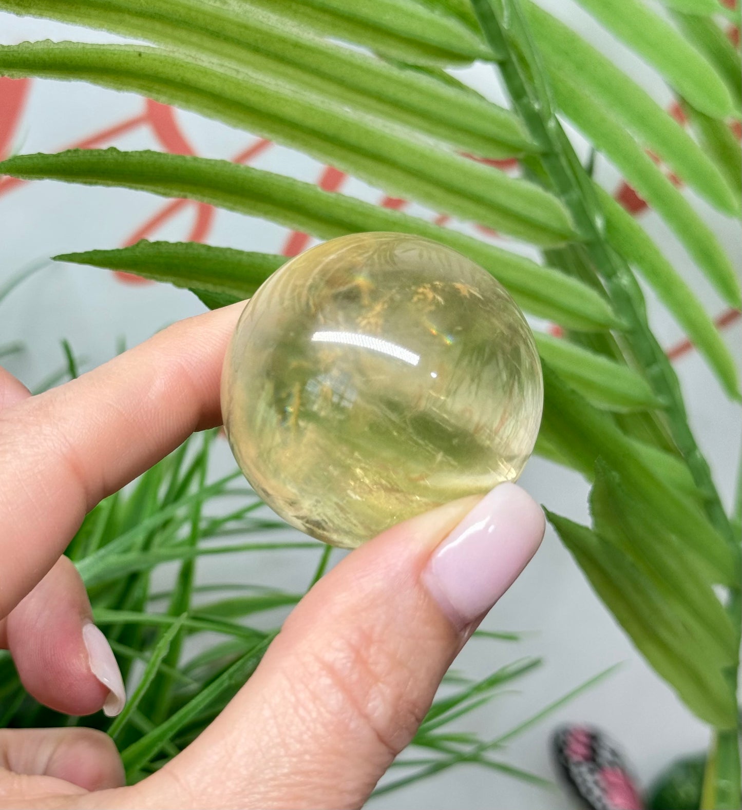 Honey calcite sphere. 40mm includes a sphere stand