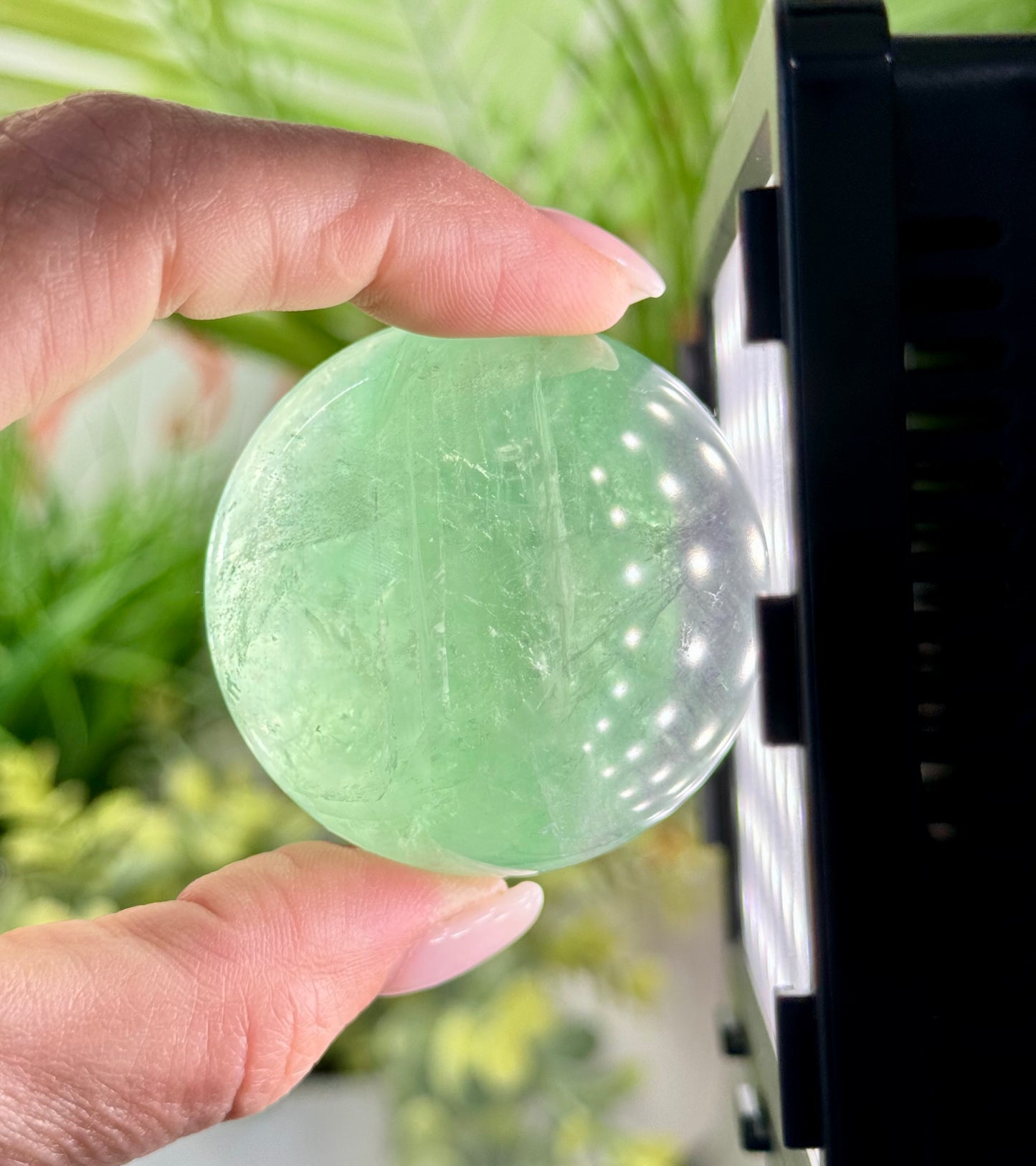 Green fluorite sphere. 37mm and will include a sphere stand. * see attached photos for back lighting