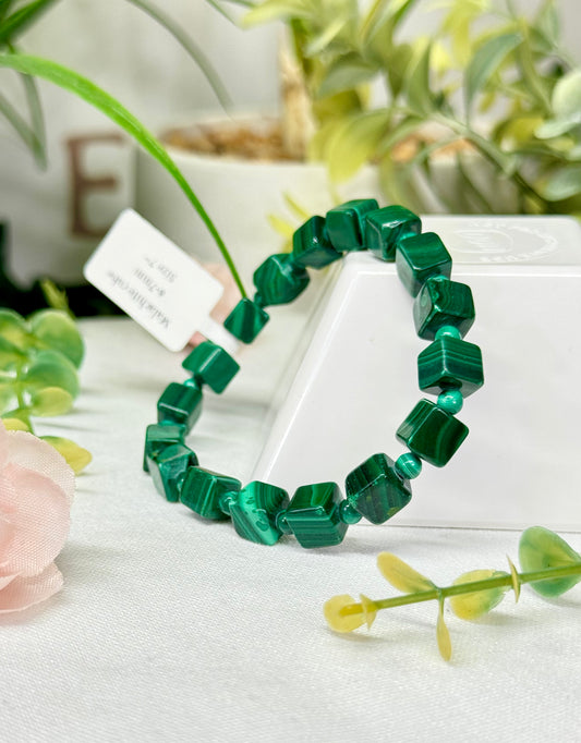 Malachite cube bracelet. 6-7mm beads and fits wrist size 7”