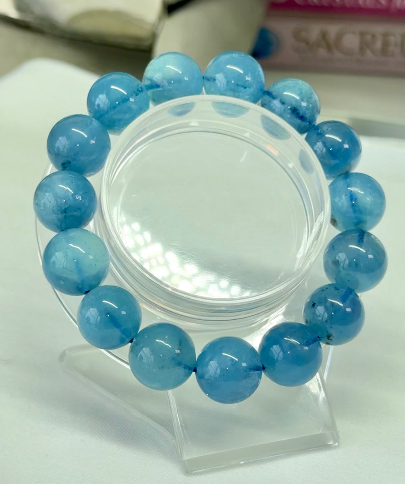 HQ aquamarine bracelet. With asterisms and chatoyancy. Deep blue color and fabulous! Please see all pics for details. 13.6mm beads and fits wrist size 7” can be downsized