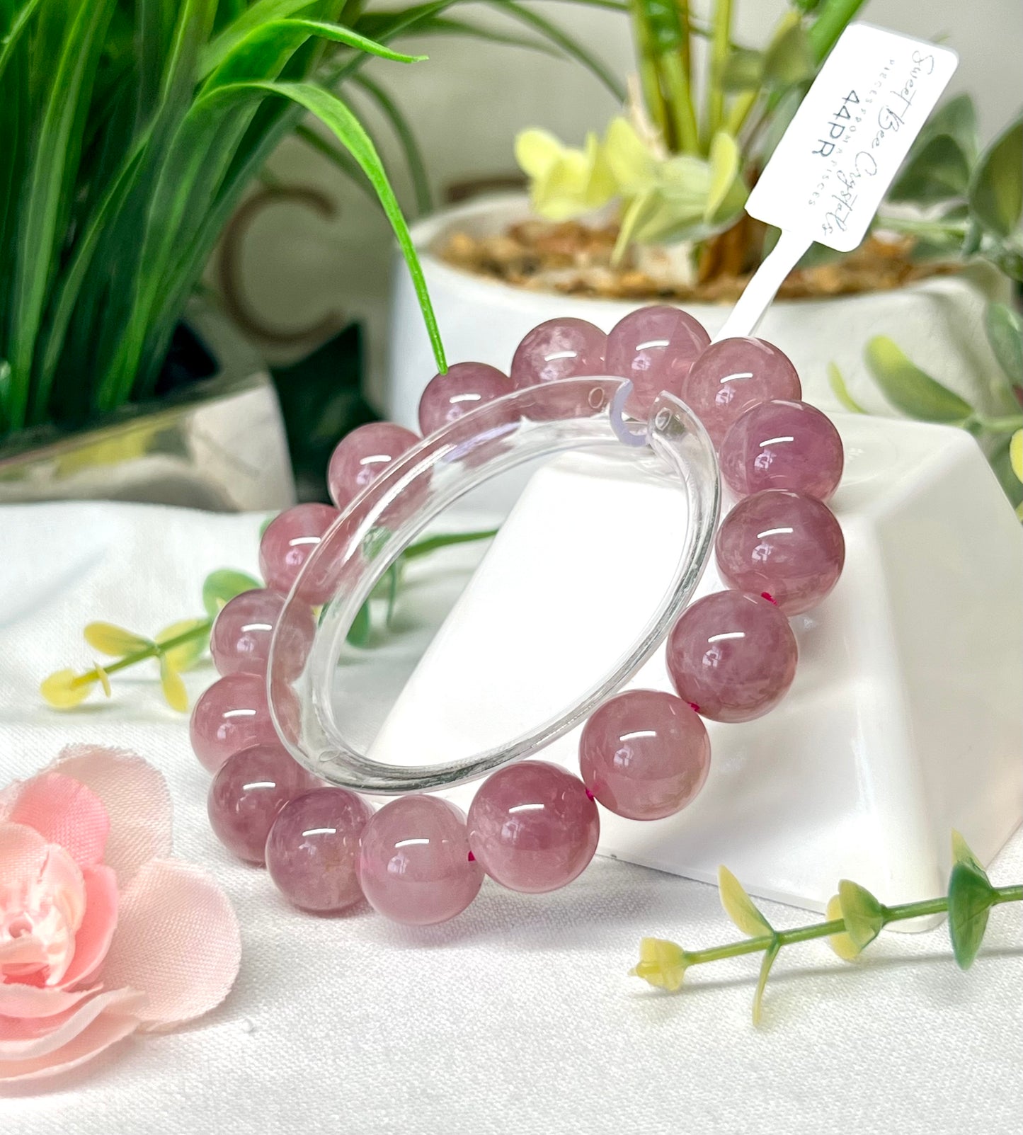 HQ purple rose Quartz with asterisms. 13.1 mm beads and fits wrist size 7”*