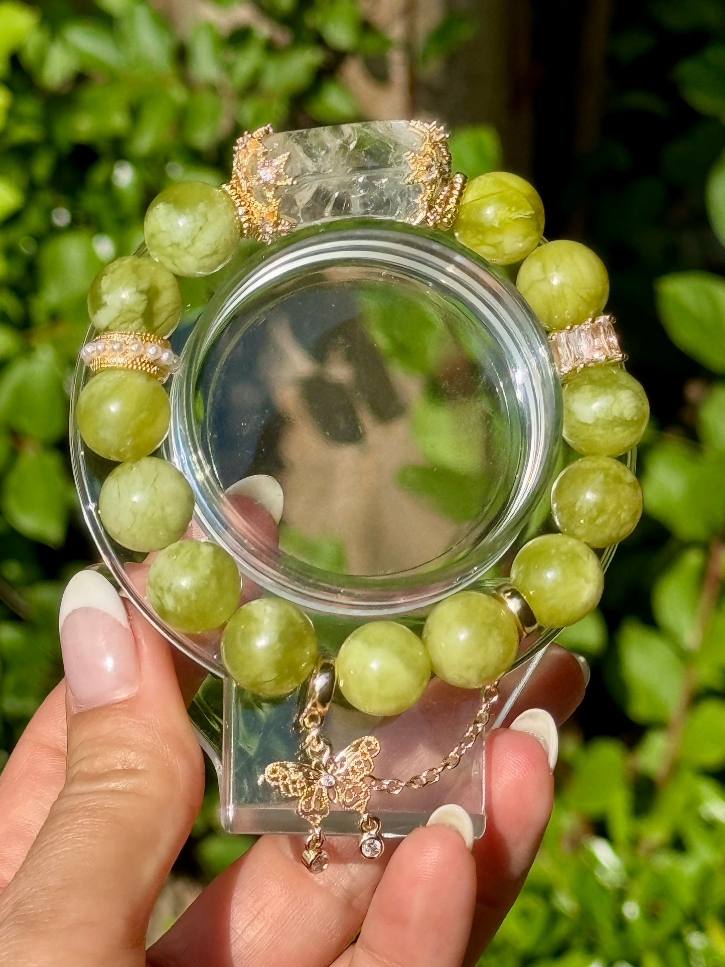 Serpentine jade design bracelet with clear quartz Freeform and butterfly chain detail. 12.3mm beads fits wrist size 6.5-6.75”