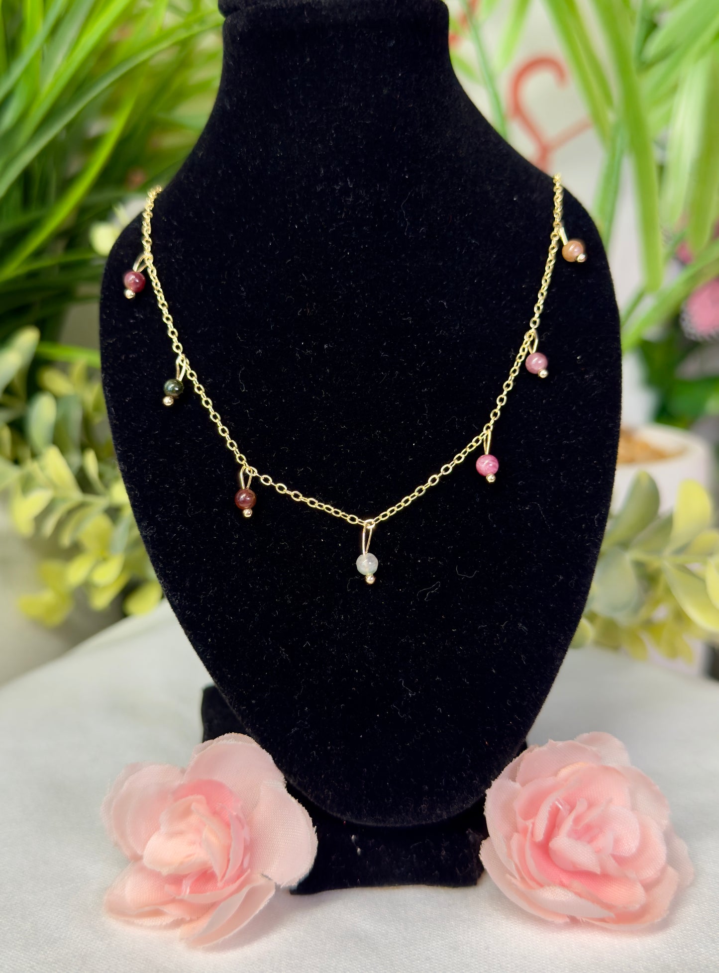 Dainty rainbow tourmaline necklace with drop beads. Gold plated copper and fits size 16.5”-18.5” with clasp closure