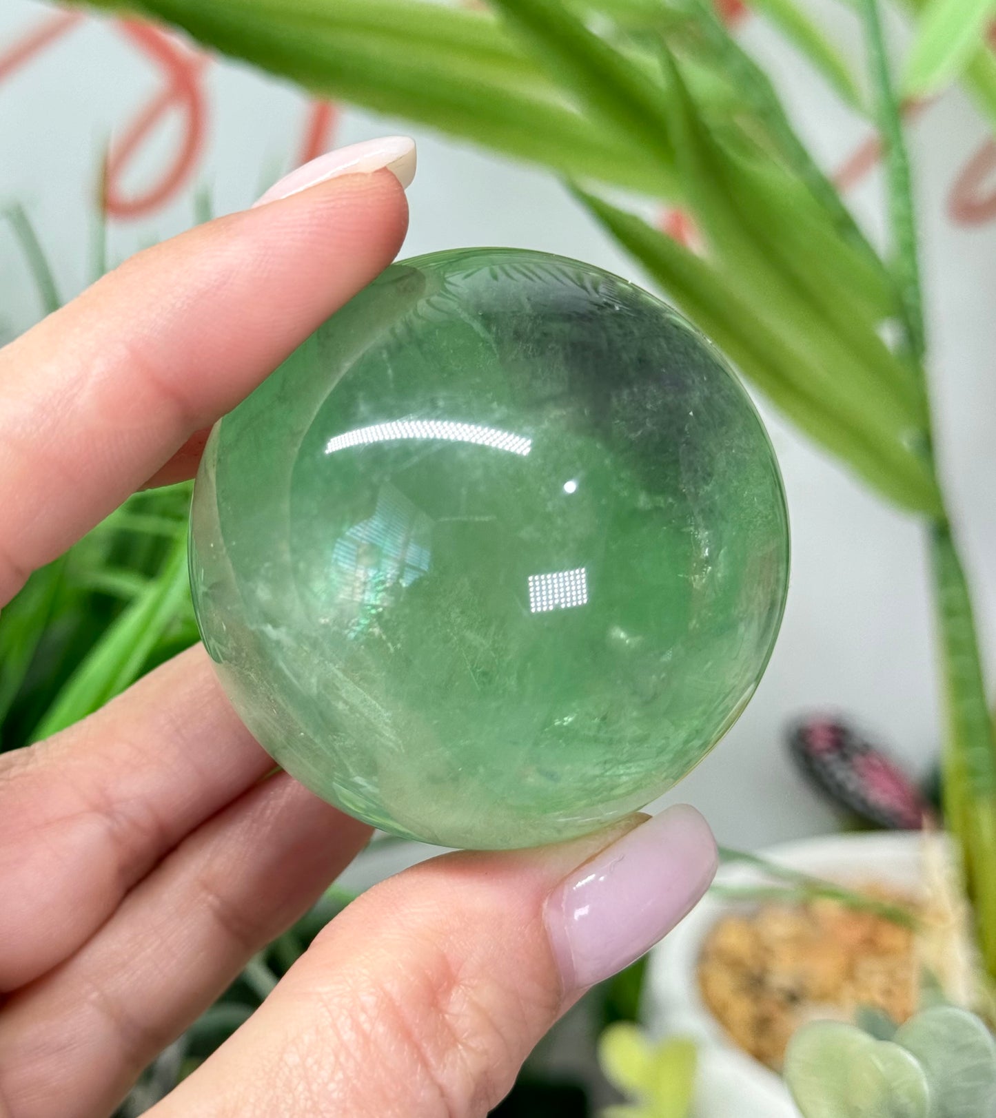 Green fluorite sphere. 37mm and will include a sphere stand. * see attached photos for back lighting