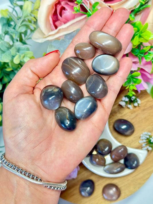 Black moonstone tumbles with nice flash