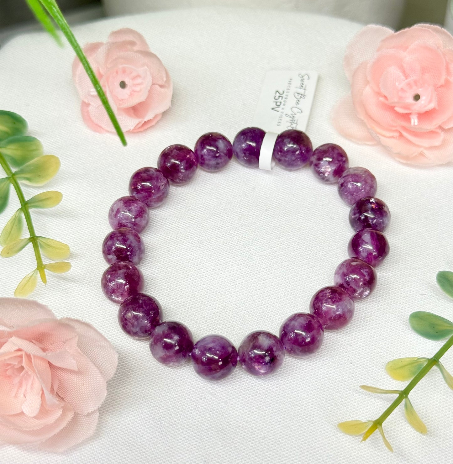 Purple Muscovite bracelet. 10.2 mm beads and fits a size 7” wrist. See photos for details.