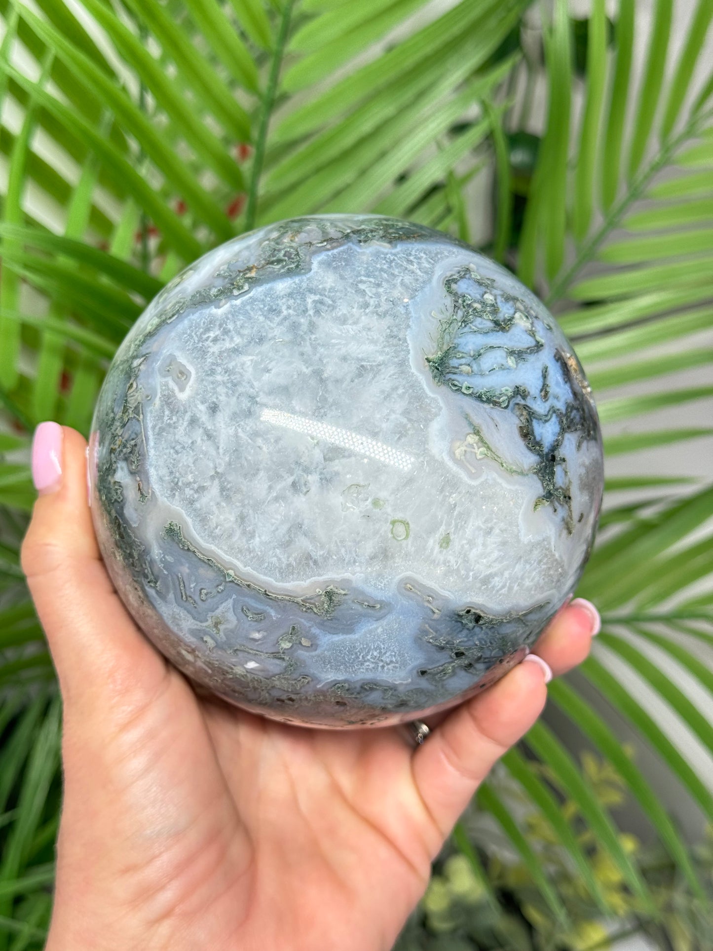 XXL moss agate sphere. 108mm and weighs 4lbs. Includes free sphere stand