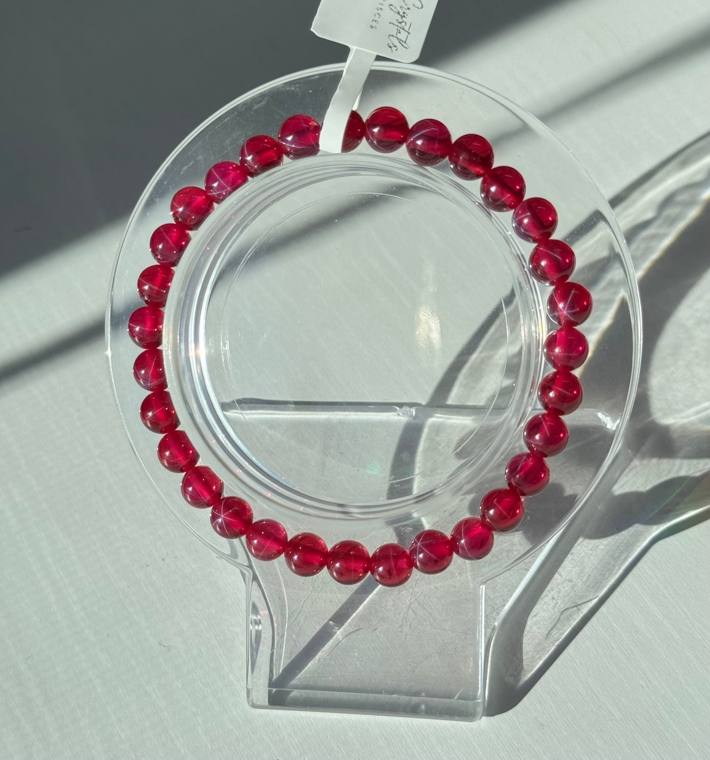 Lab created 6 star point Ruby bracelets. 10mm and 6mm available. Please select bead size from options