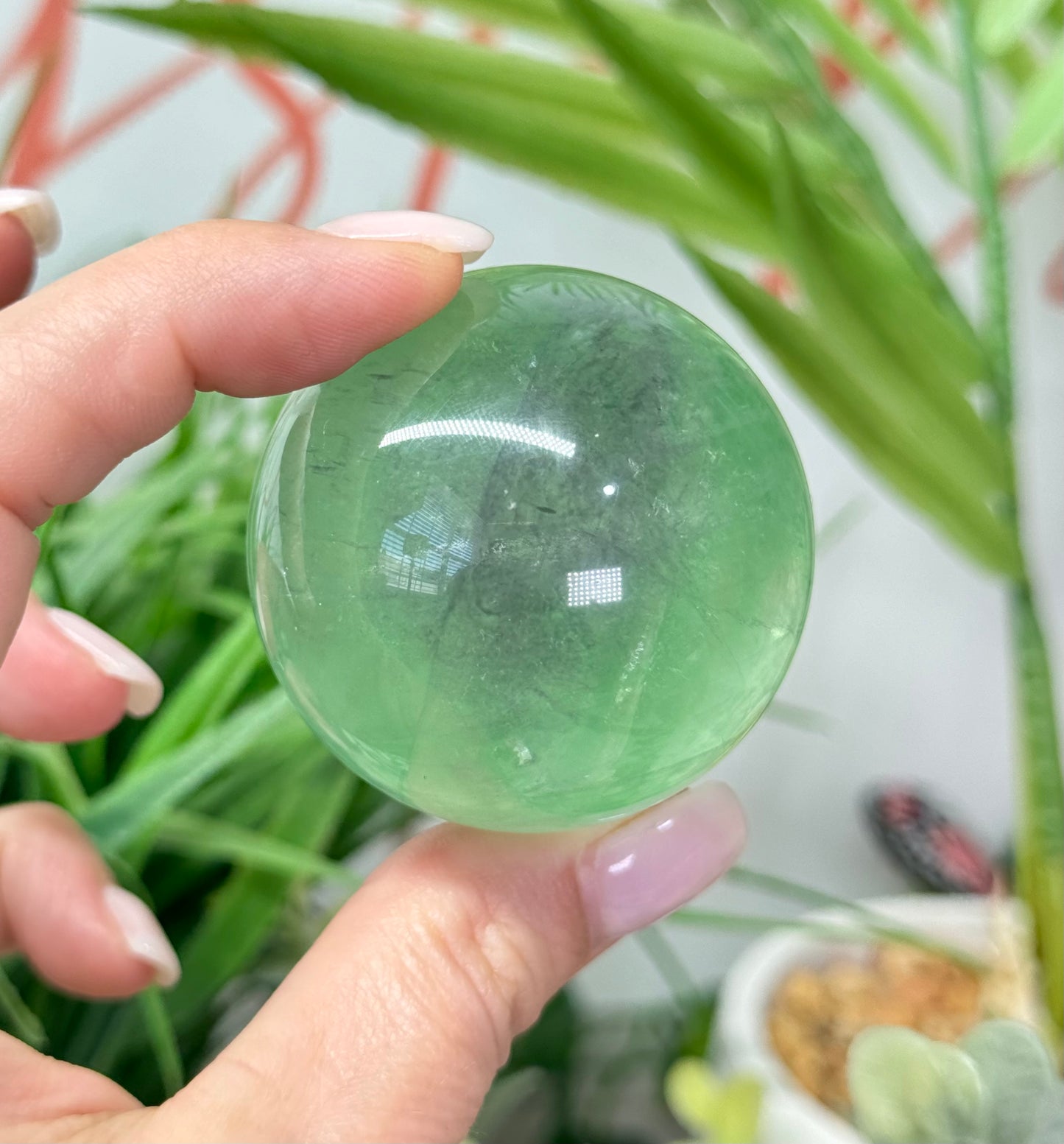 Green fluorite sphere. 37mm and will include a sphere stand. * see attached photos for back lighting