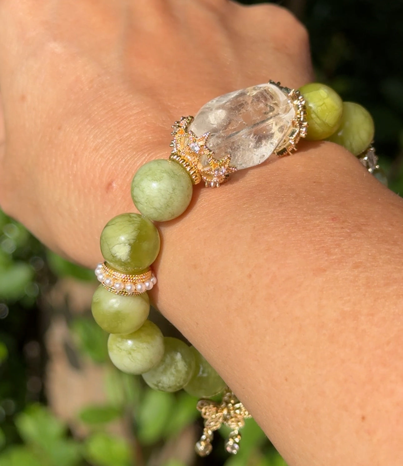 Serpentine jade design bracelet with clear quartz Freeform and butterfly chain detail. 12.3mm beads fits wrist size 6.5-6.75”