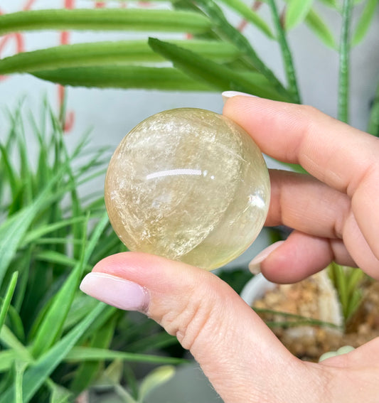 Honey calcite sphere. 43mm will include a sphere stand