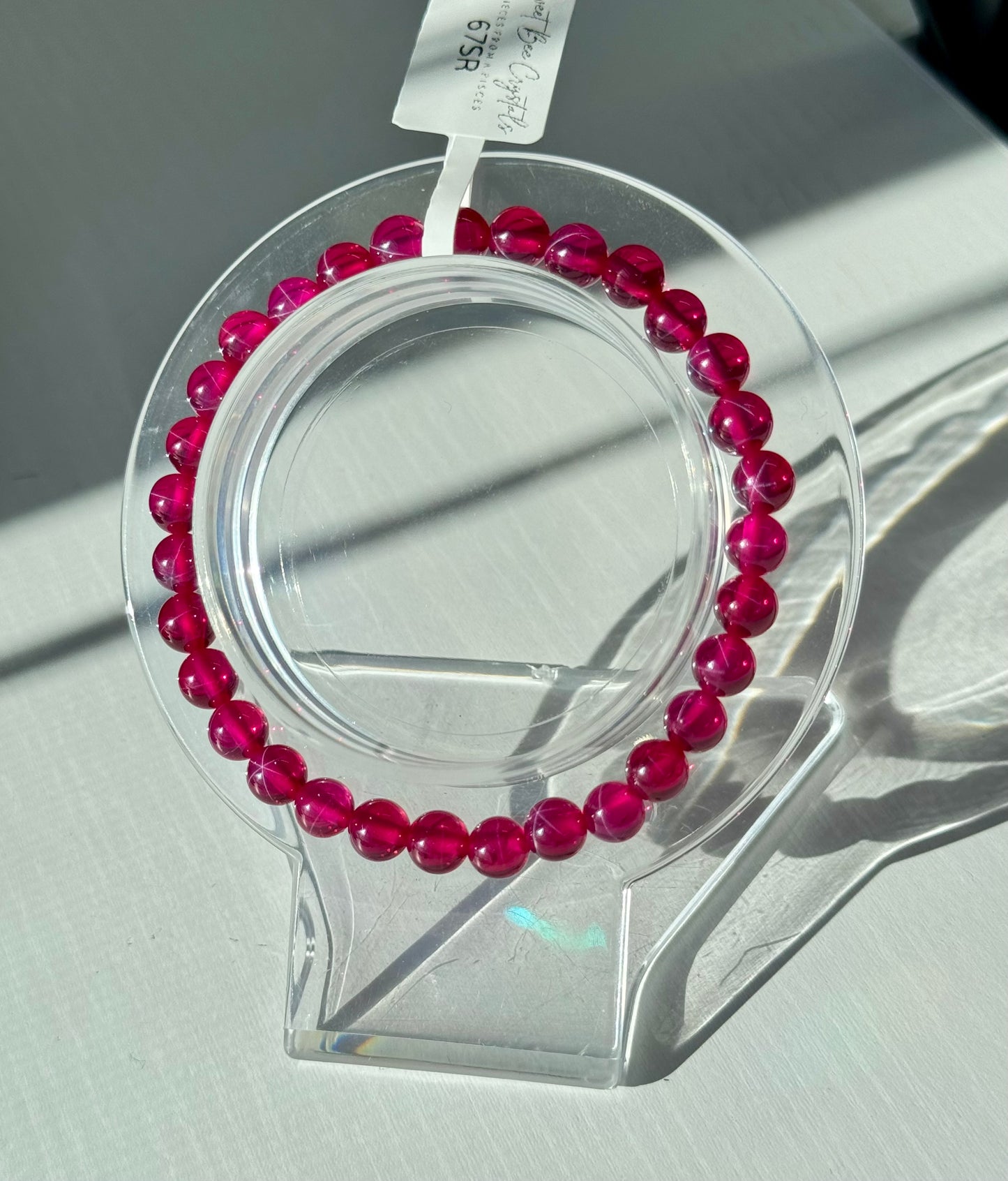 Lab created 6 star point Ruby bracelets. 10mm and 6mm available. Please select bead size from options