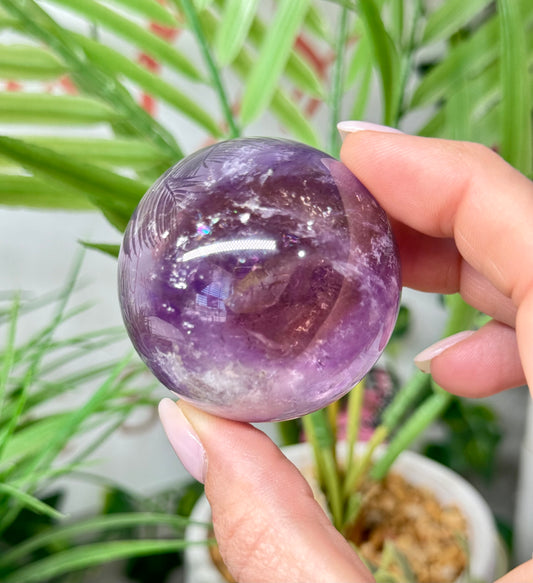 Beautiful ametrine sphere. 49mm and will include a sphere stand. *see attached photos for back lighting