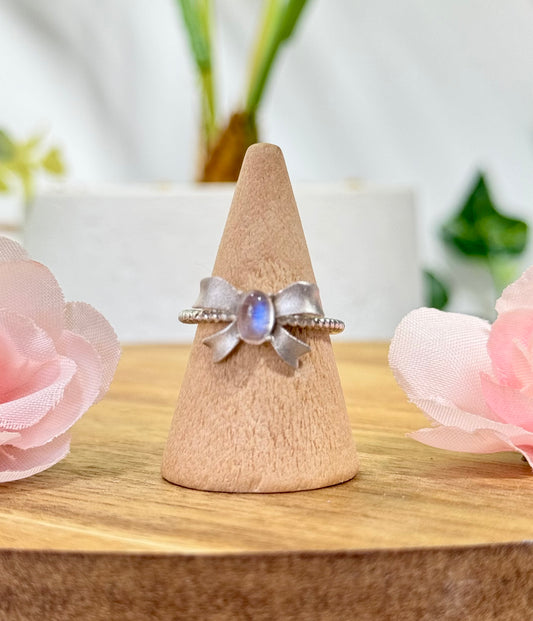 Moonstone bow ring. Brushed s925 sterling silver and adjustable to fit size 5-10