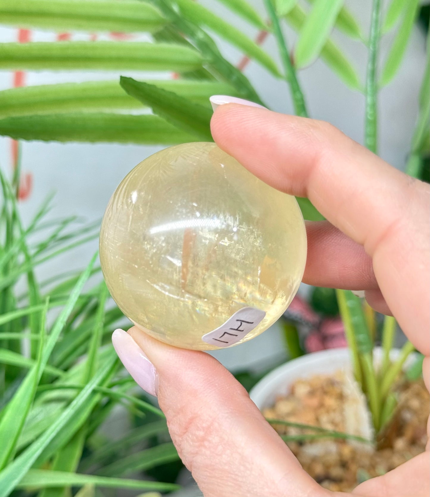 Honey calcite sphere. 43mm will include a sphere stand