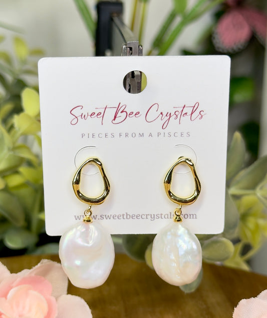 Baroque pearl drop earrings with silicon backs. 18k gold plated stainless steel