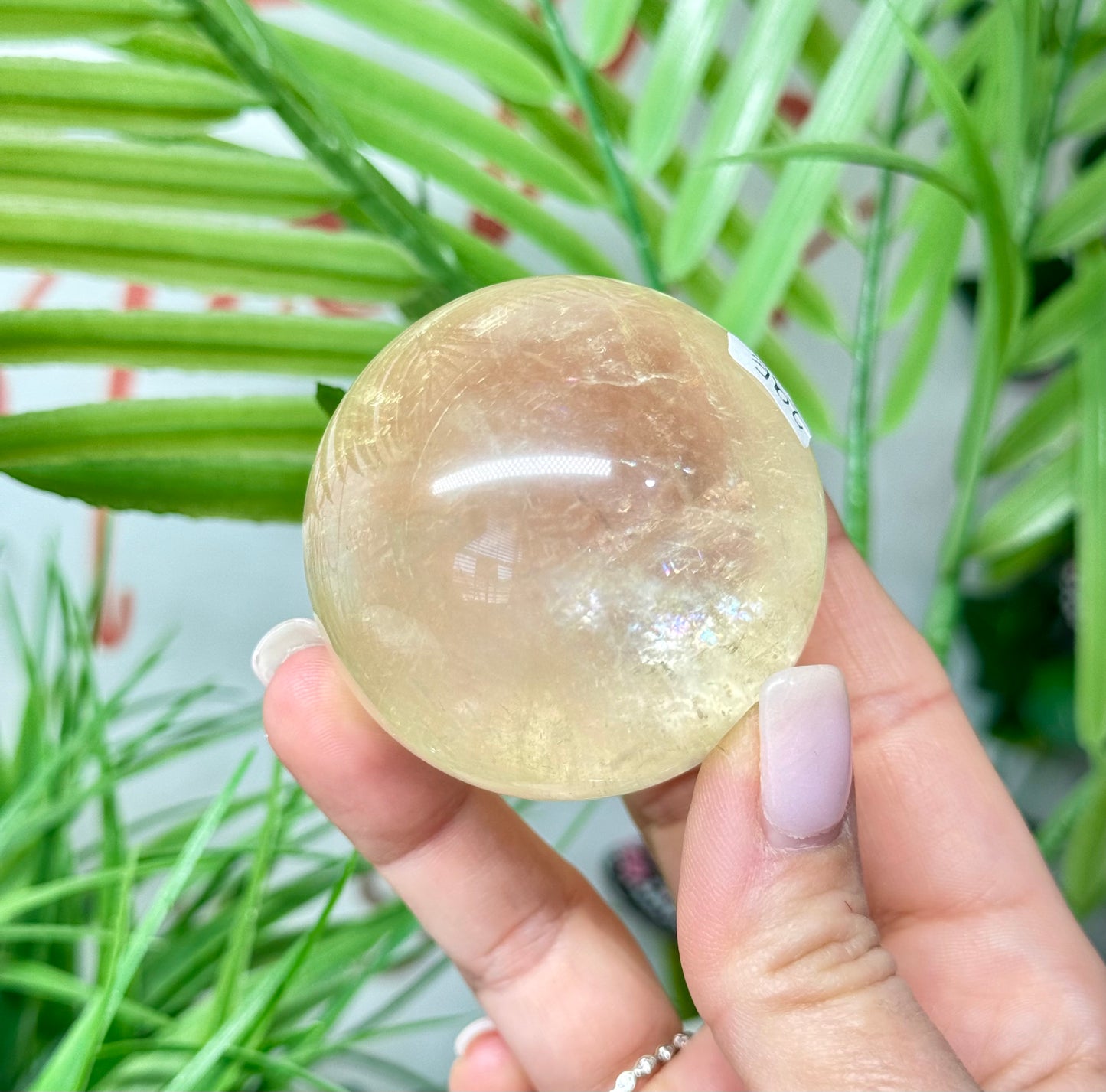 Honey calcite sphere. 52.5mm will include a sphere stand