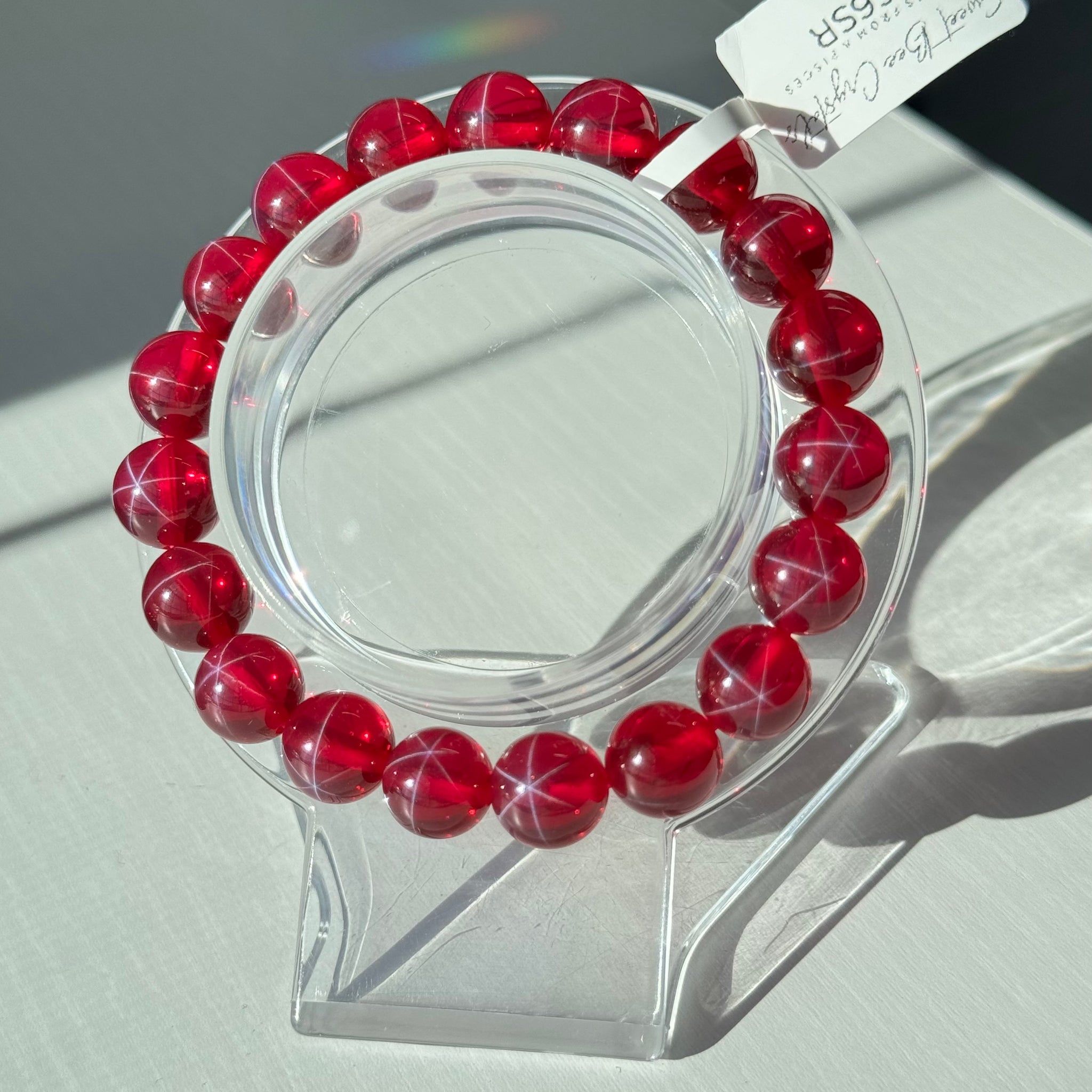 Lab created 6 star point Ruby bracelets. 10mm and 6mm available. Please select bead size from options