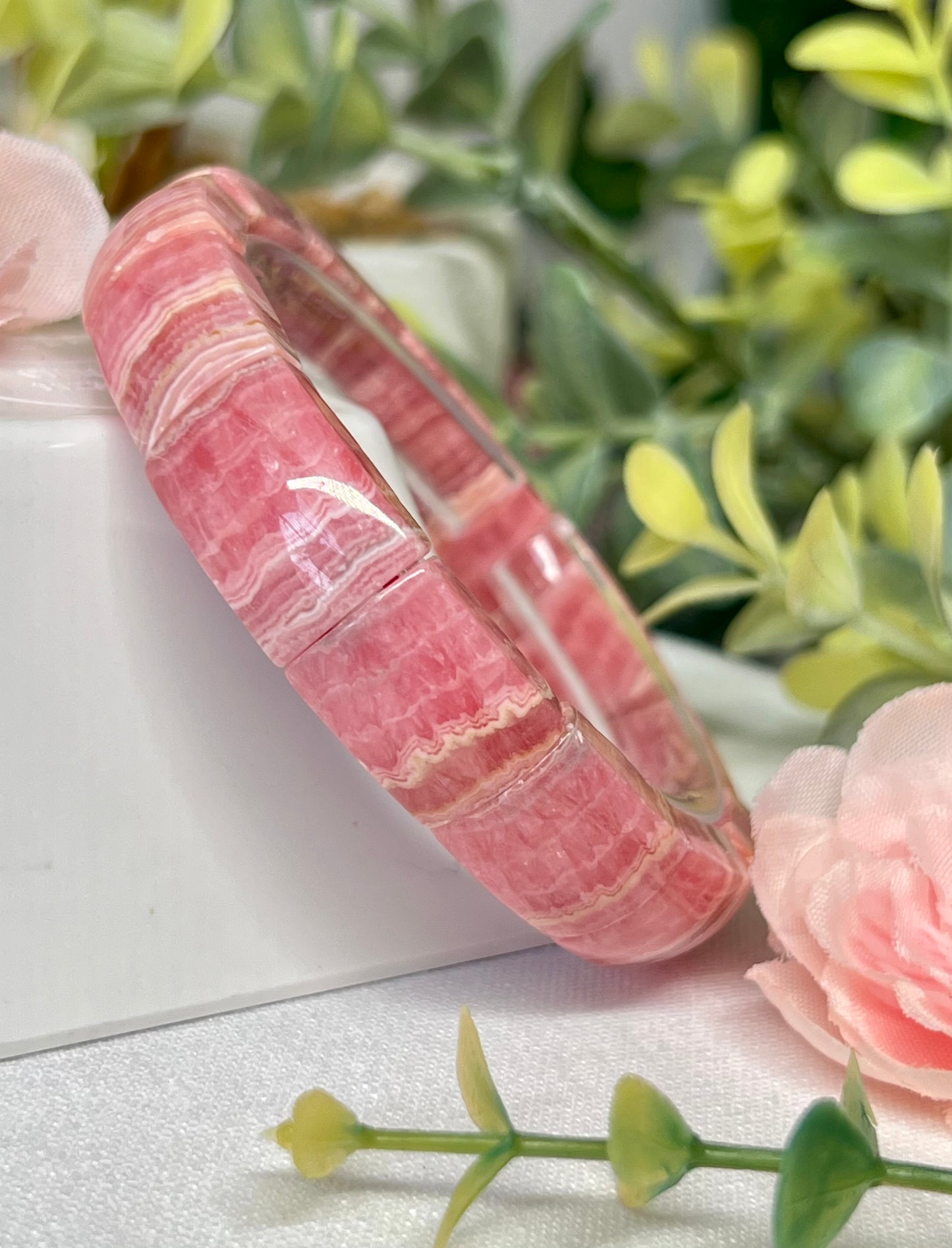 HQ rhodochrosite soft Bengal. See all photos for detailed view of each bead. Beads measure 12.5mm and fits a wrist size 7”*