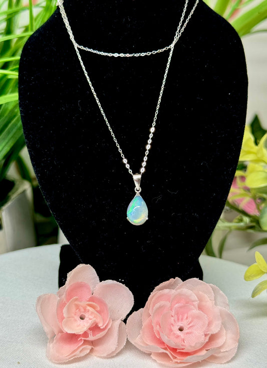 Opal teardrop necklace with gorgeous flash! S925 sterling silver with 18” chain. See attached video