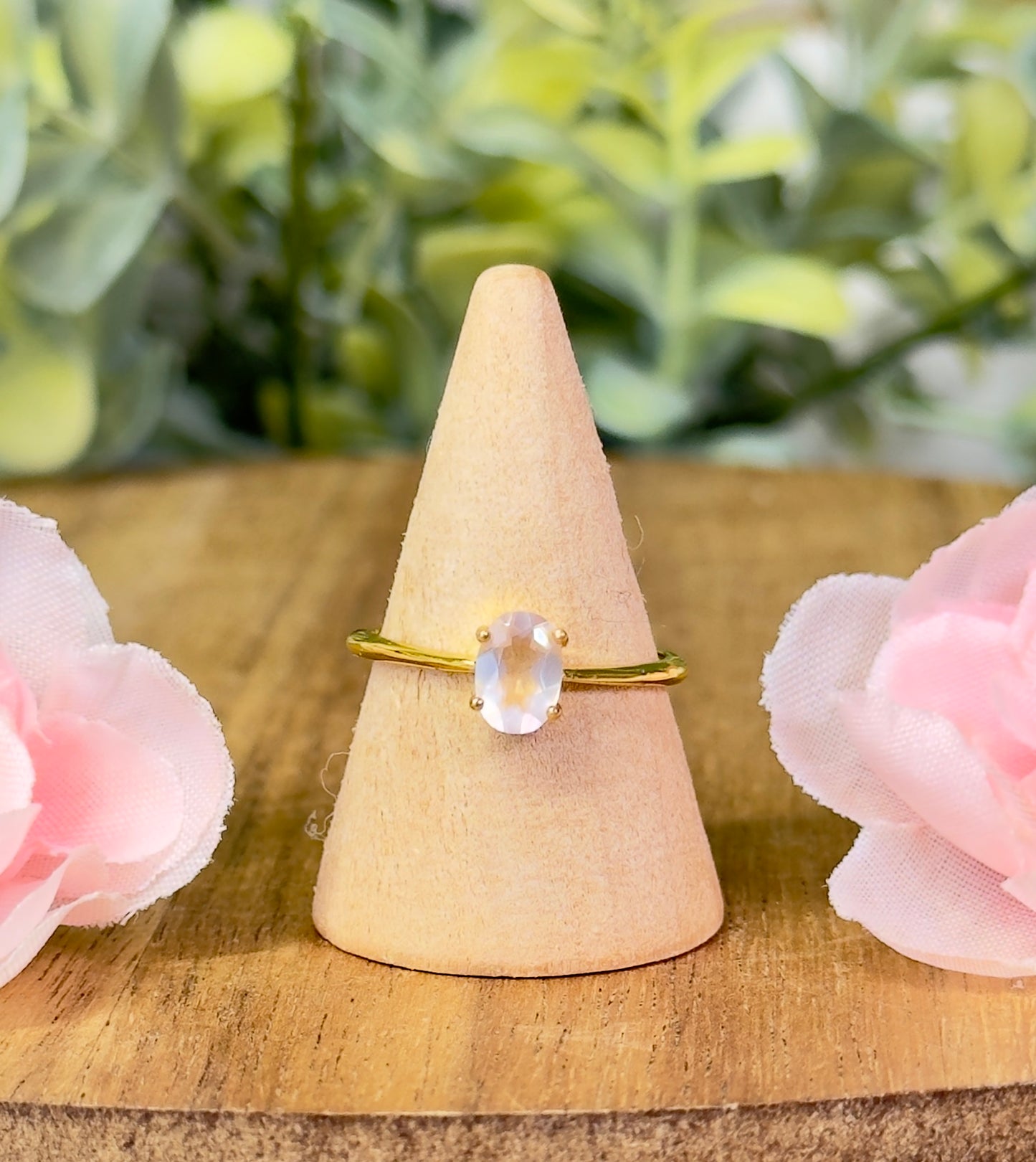 Silver or gold simple moonstone ring. Size is adjustable.