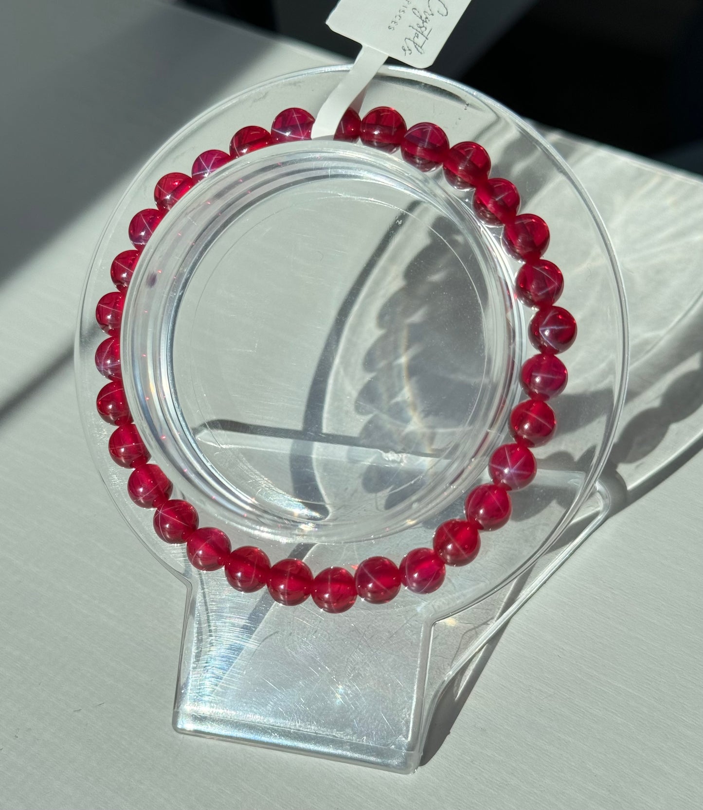 Lab created 6 star point Ruby bracelets. 10mm and 6mm available. Please select bead size from options