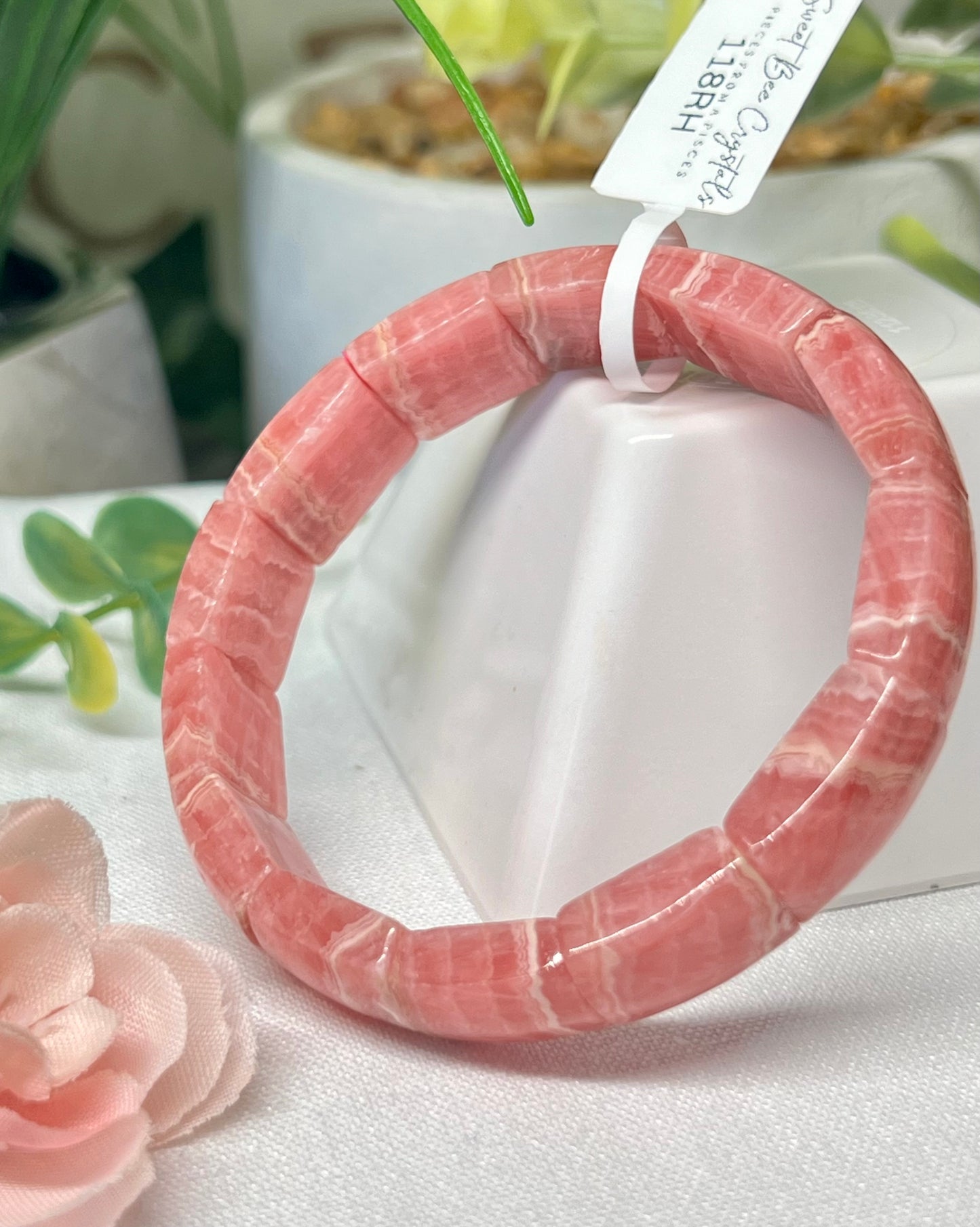 HQ rhodochrosite soft Bengal. See all photos for detailed view of each bead. Beads measure 12.5mm and fits a wrist size 7”*