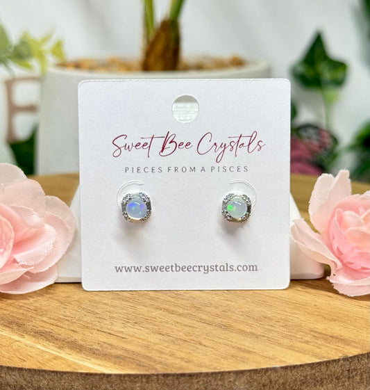 Ethiopian opal earrings. Silver plated copper and includes silicon earring backs.