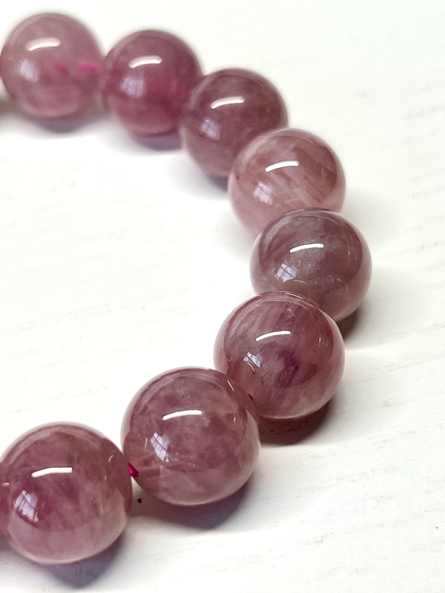 HQ purple rose Quartz with asterisms. 11.5mm beads and fits wrist size 7”*