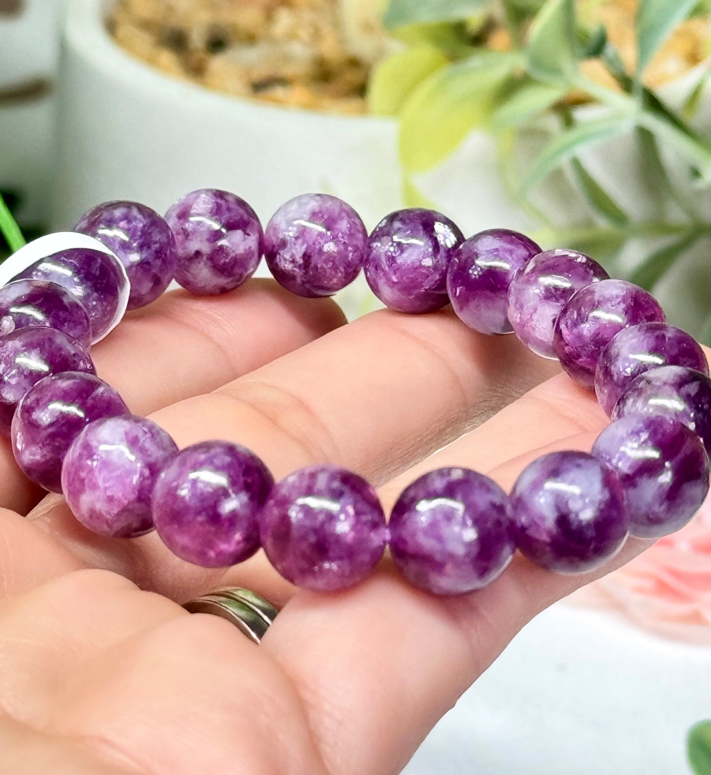 Purple Muscovite bracelet. 10.2 mm beads and fits a size 7” wrist. See photos for details.