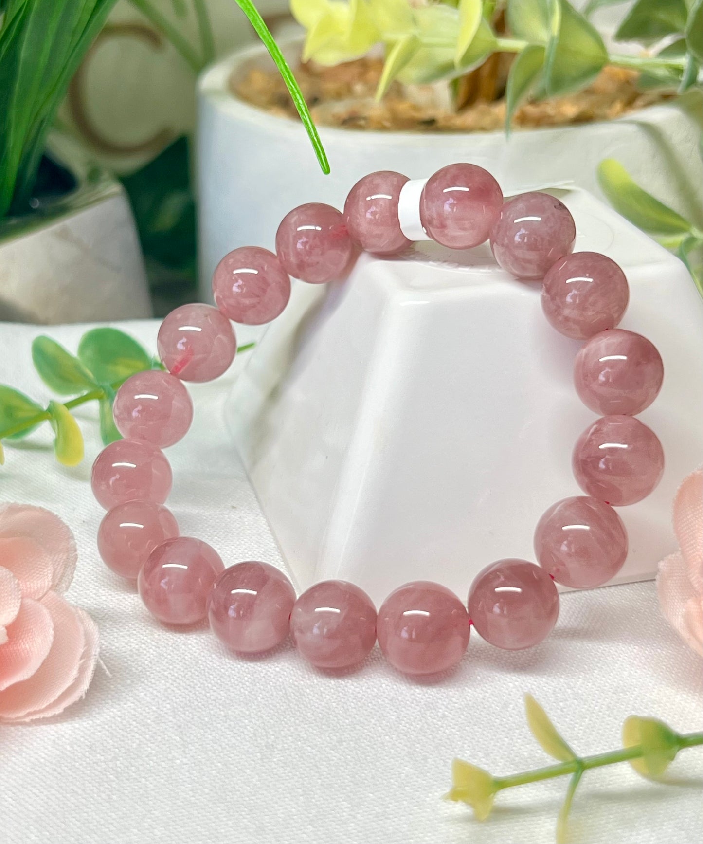 HQ purple rose Quartz with asterisms. 11.5mm beads and fits wrist size 7”*