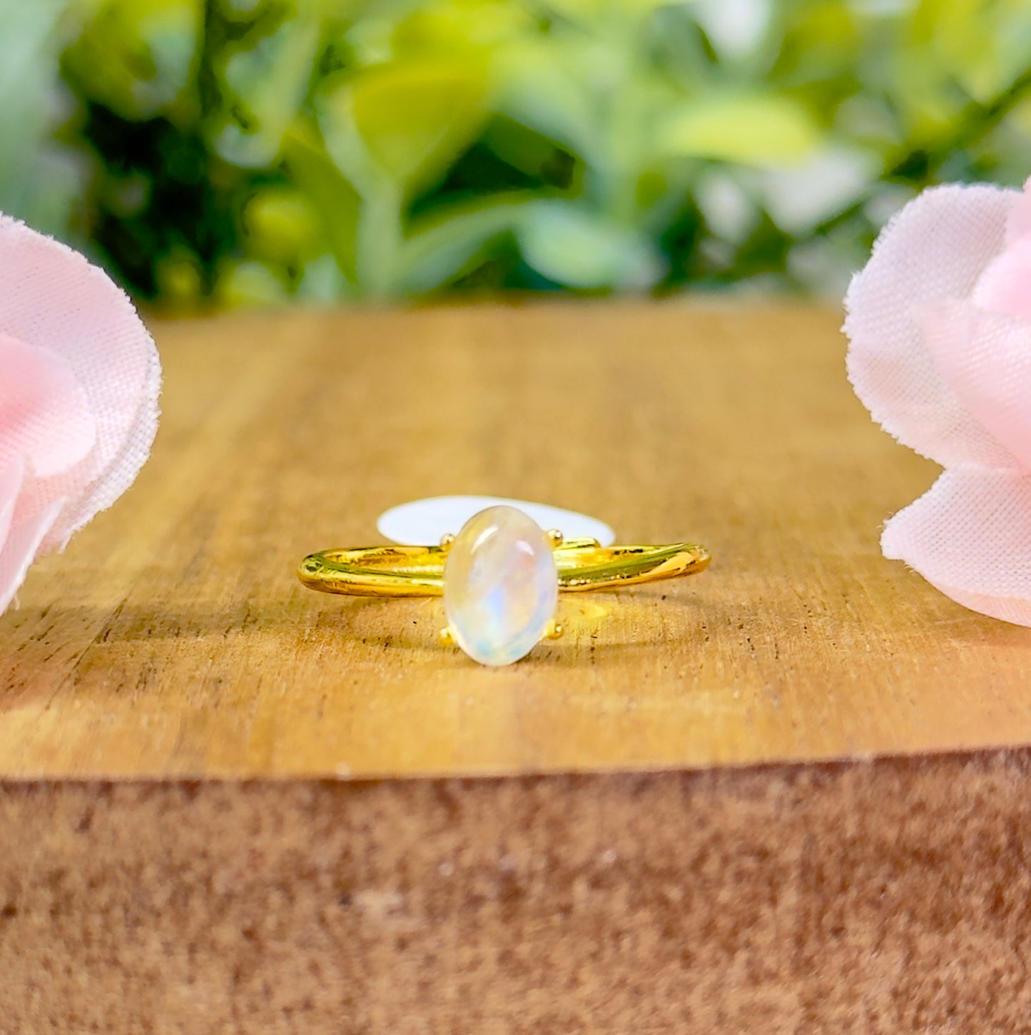 Silver or gold simple moonstone ring. Size is adjustable.