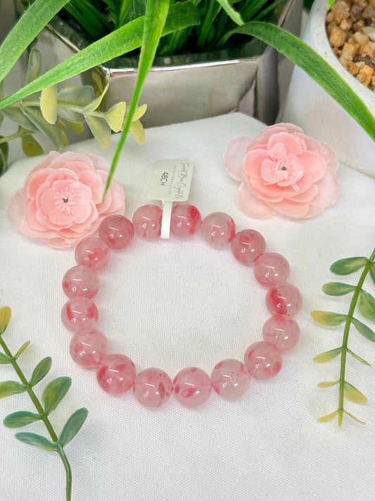 Cherry rhodonite bracelet. 12mm beads. Fits size 7.5” wrist. Can be resized, please see description