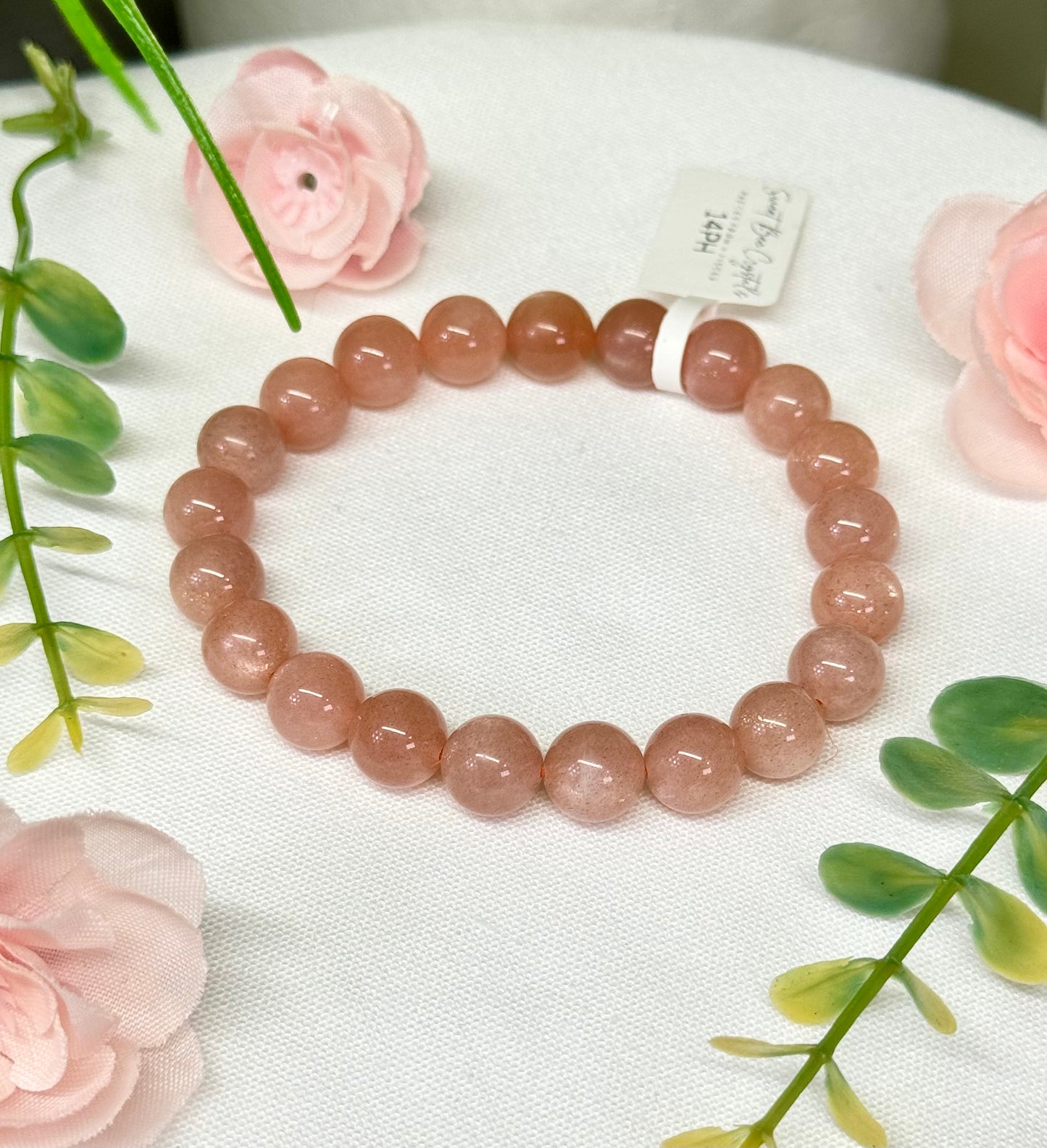 Peach moonstone bracelet. 8mm beads and fits wrist size 7”