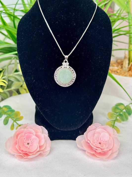 Jade disc necklace with adjustable chain 18” and smaller, silver plated copper