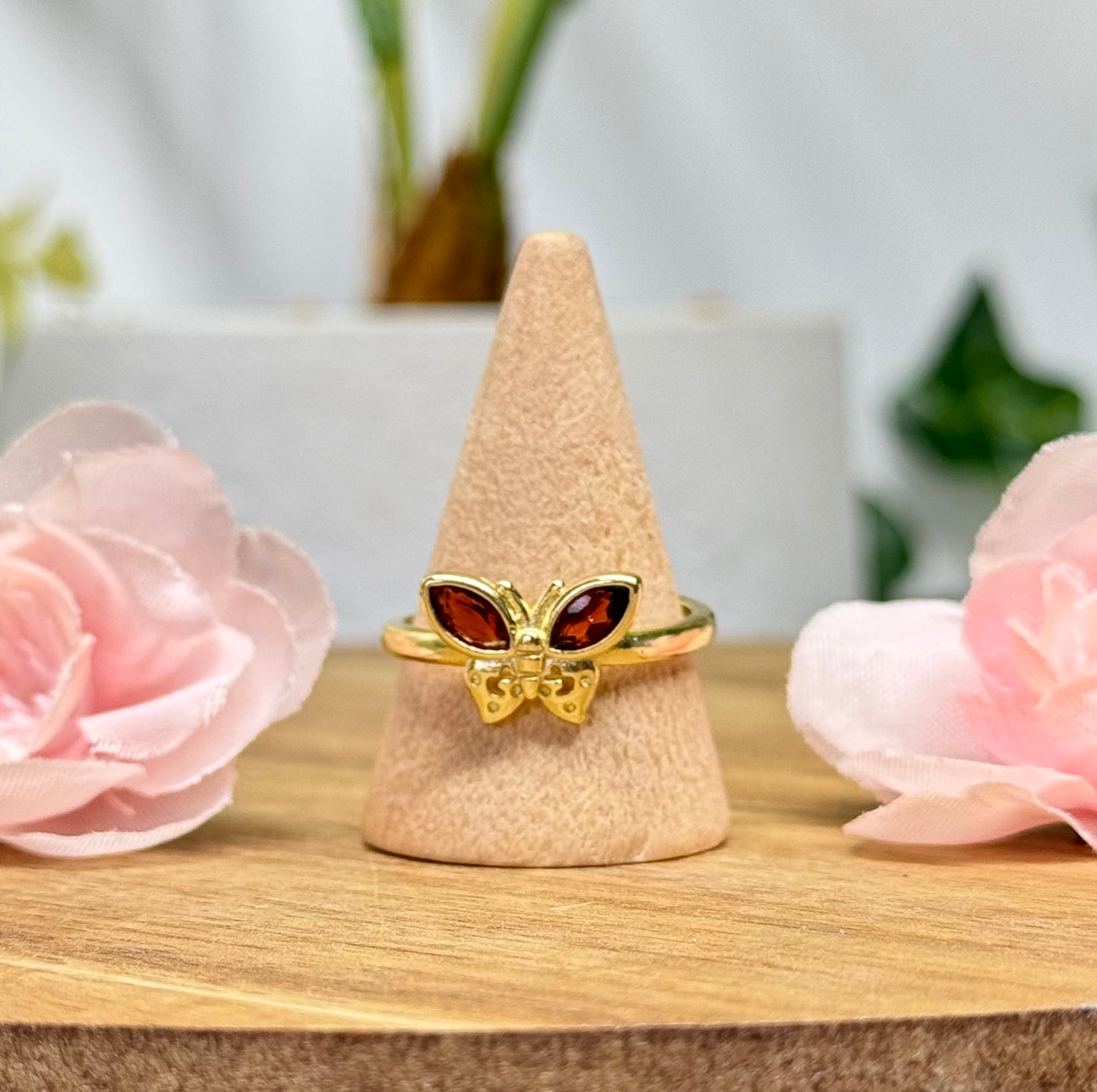 Garnet butterfly ring. Gold plated copper and adjustable to fit size 5-10