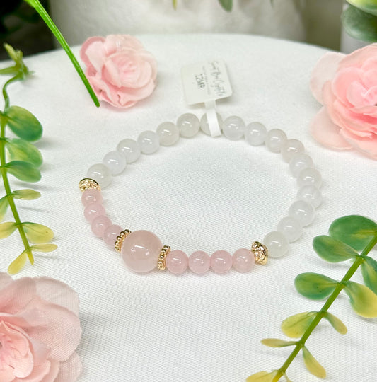 Rose Quartz and moonstone design bracelet. 6mm/10mm beads. Fits wrist size 7”