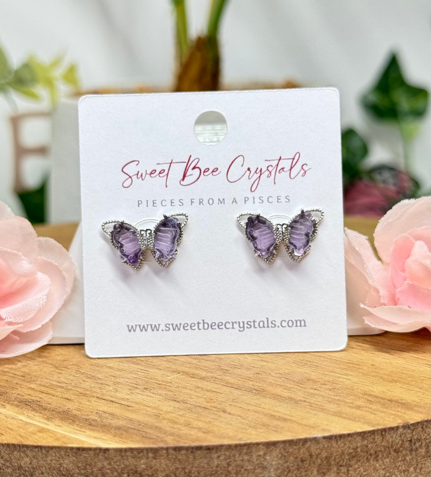 Purple fluorite butterfly earrings. Silver plated copper and includes silicon earring backs.