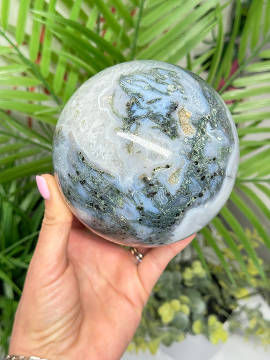 XXL moss agate sphere. 108mm and weighs 4lbs. Includes free sphere stand