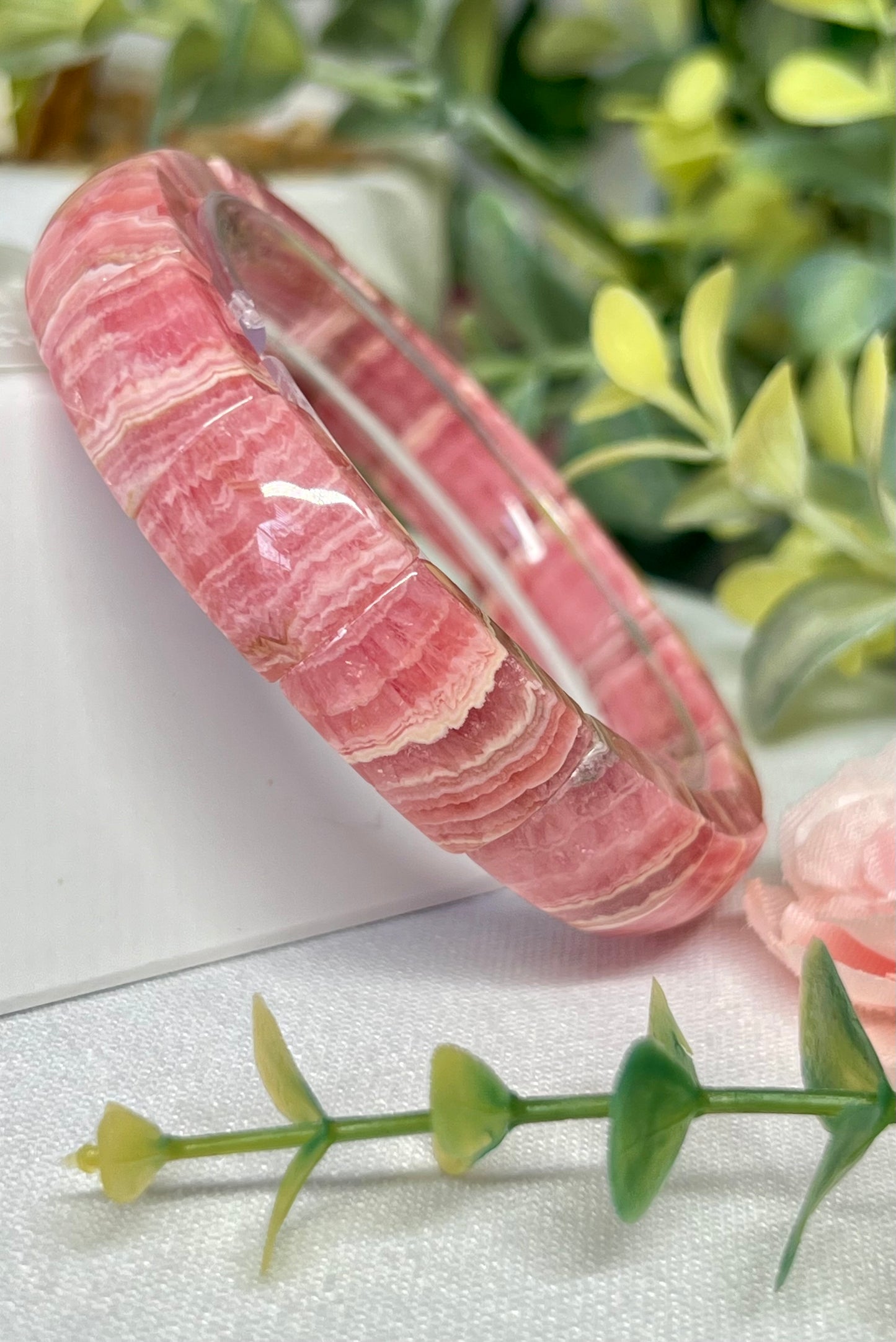 HQ rhodochrosite soft Bengal. See all photos for detailed view of each bead. Beads measure 12.5mm and fits a wrist size 7”*