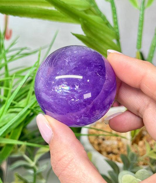 Beautiful amethyst sphere. 46.5mm and will include a sphere stand. *see attached photos for back lighting