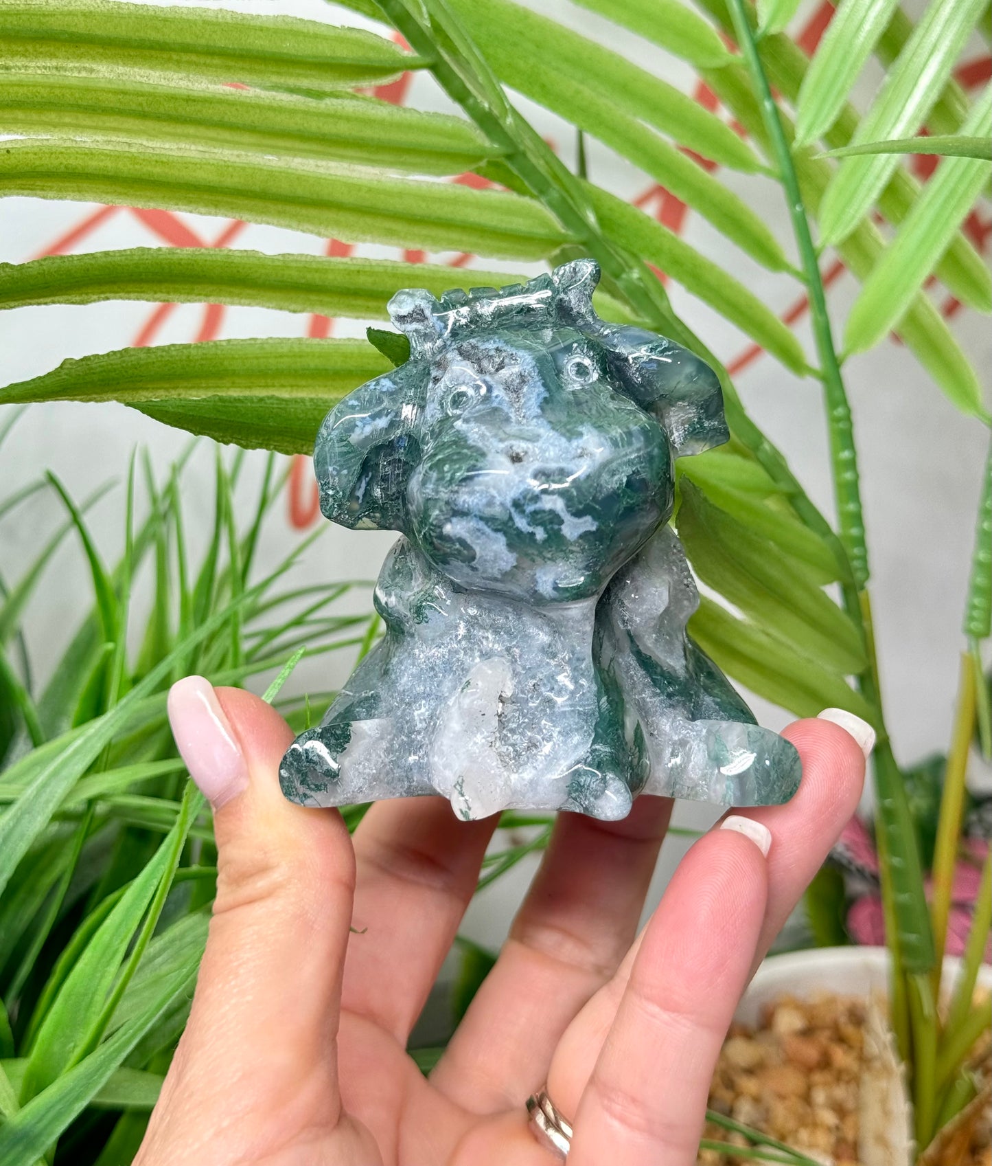 Moss agate sitting cow carving. Measures 3.25” tall and 2.5” wide