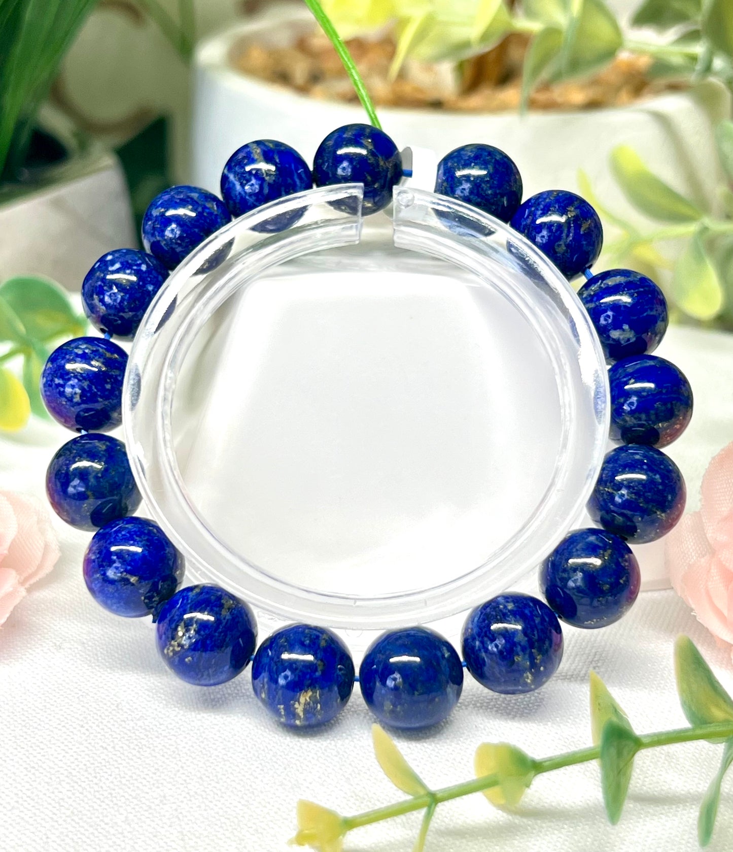 HQ lapis lazuli with pyrite inclusions. 11.7 mm beads and fits wrist size 7”*