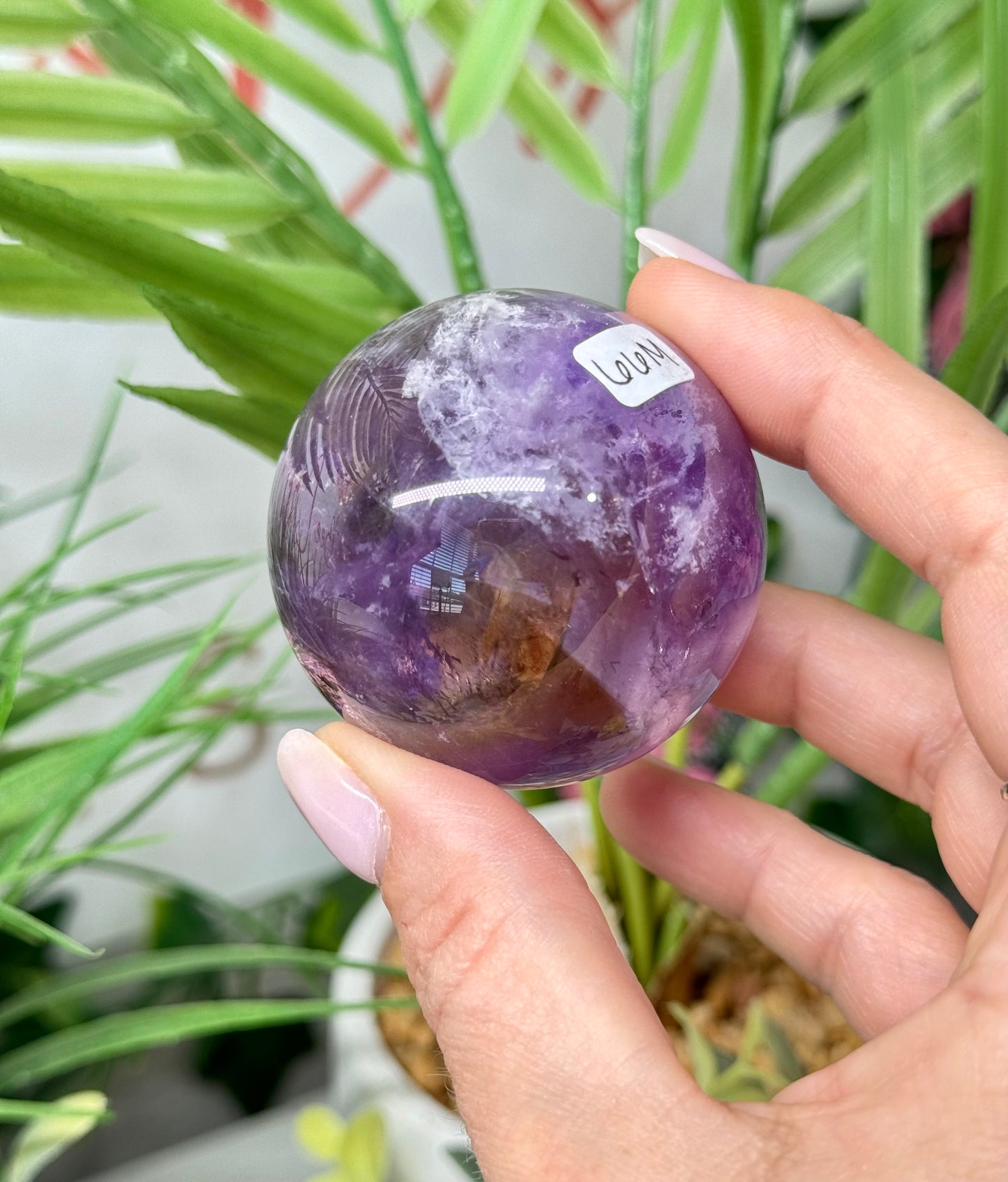 Beautiful ametrine sphere. 49mm and will include a sphere stand. *see attached photos for back lighting